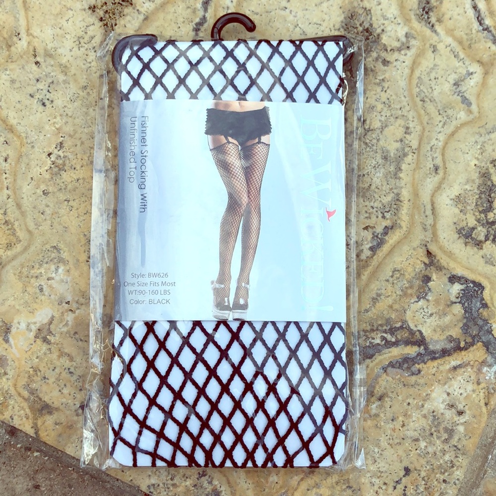 Black fishnet stocking with unfinished top